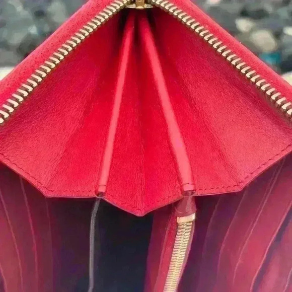 Red YSL long zippy wallet. Calfskin Leather. In GUC. Minor wear. Comes with COA - Picture 6 of 14